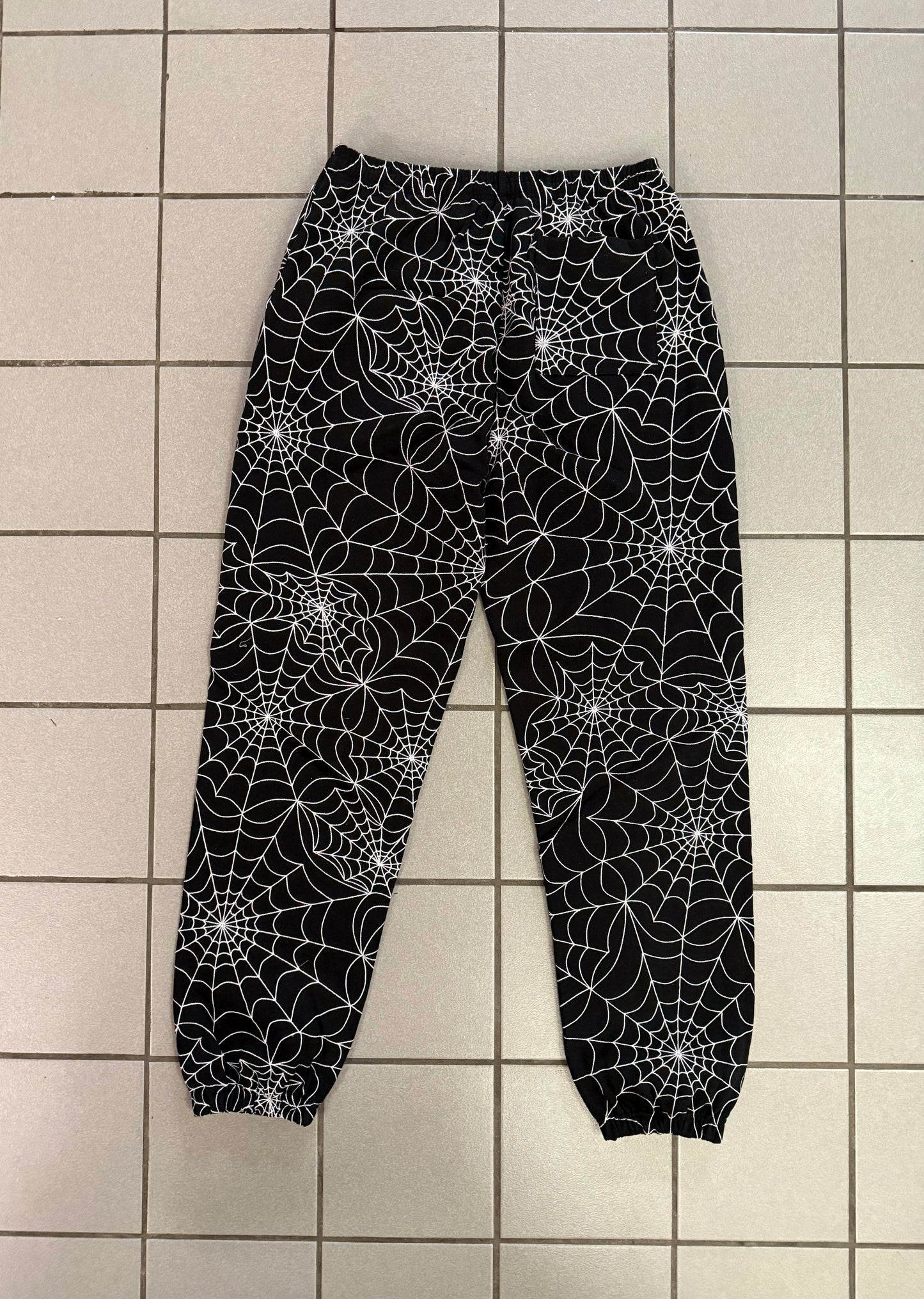 SP5DER “Embroidered Web” AOP Sweatpants