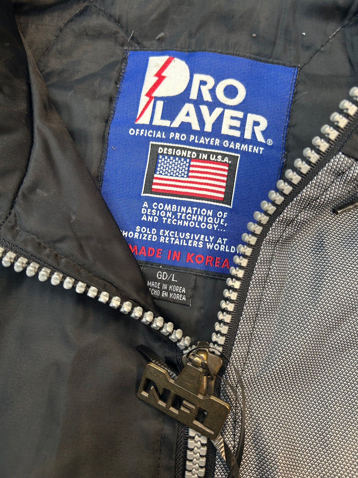 Vintage 90s Pro Player NFL  Oakland Raiders Puffer Jacket